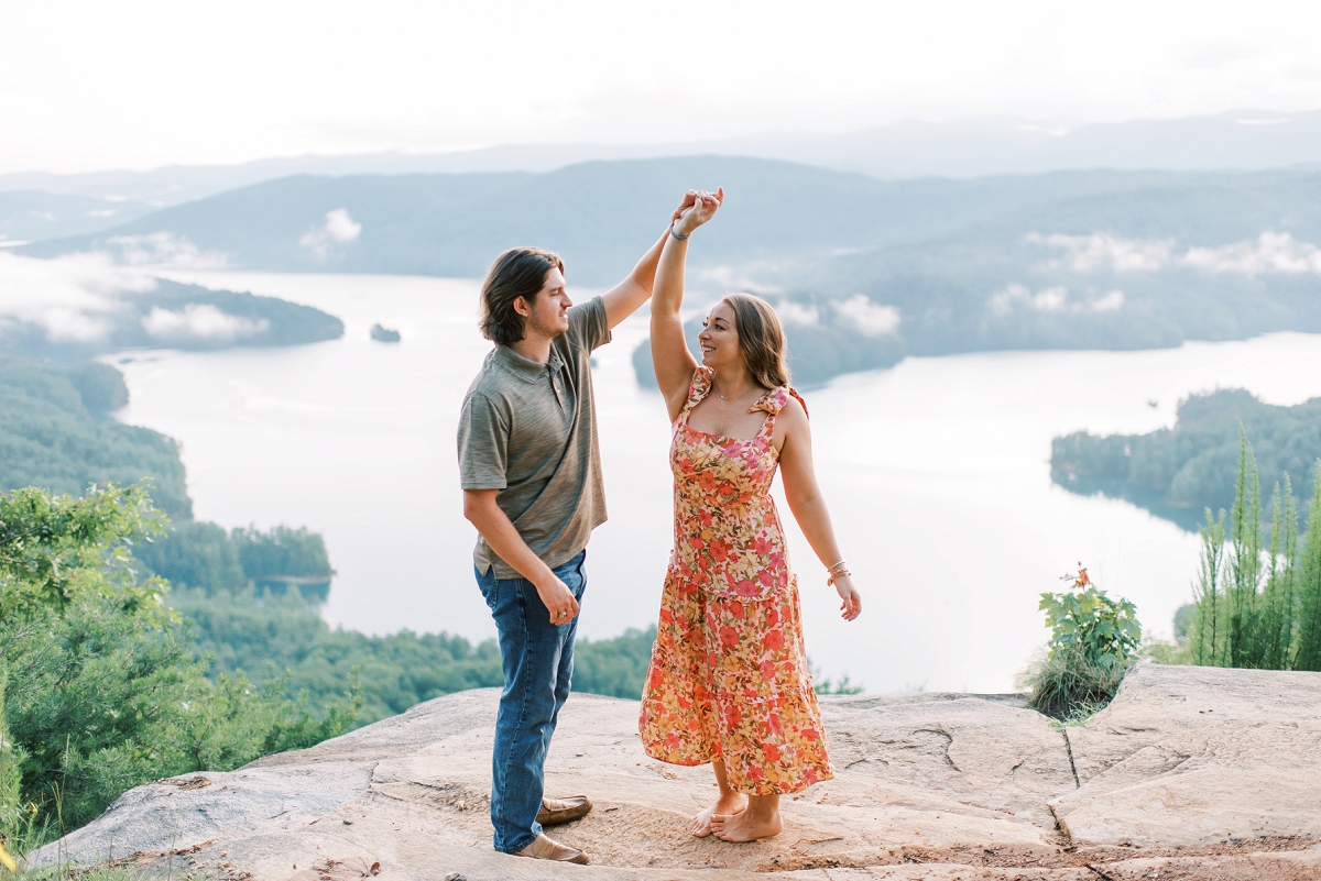 jumping off rock overlook engagement session
