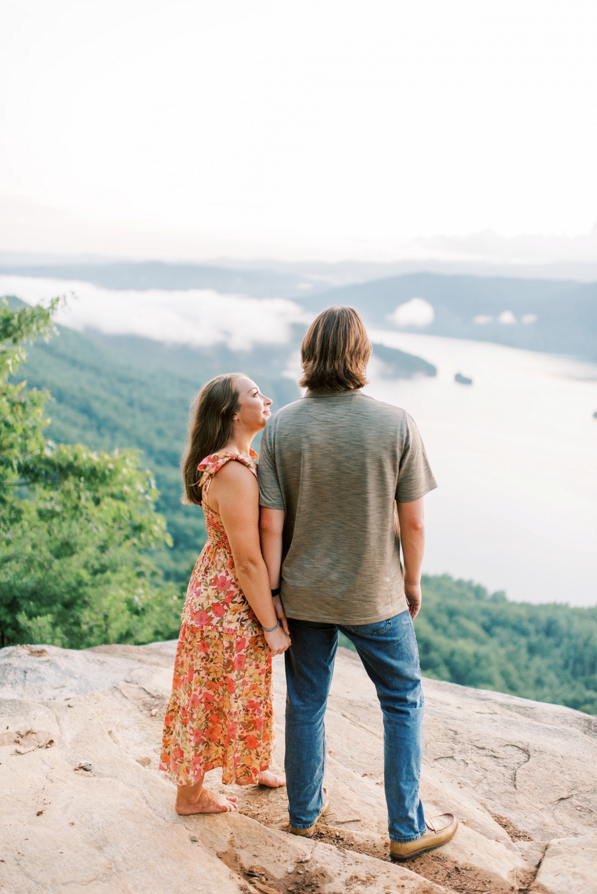 jumping off rock overlook engagement session